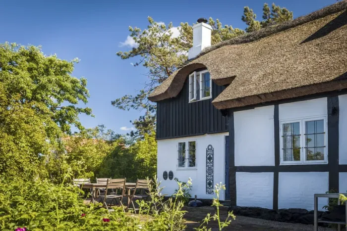 Framed Print : Idyllic half-timbered house in Listed on Bornholm, Denmark Framed Print : Idyllic half-timbered house in Listed on Bornholm, Denmark