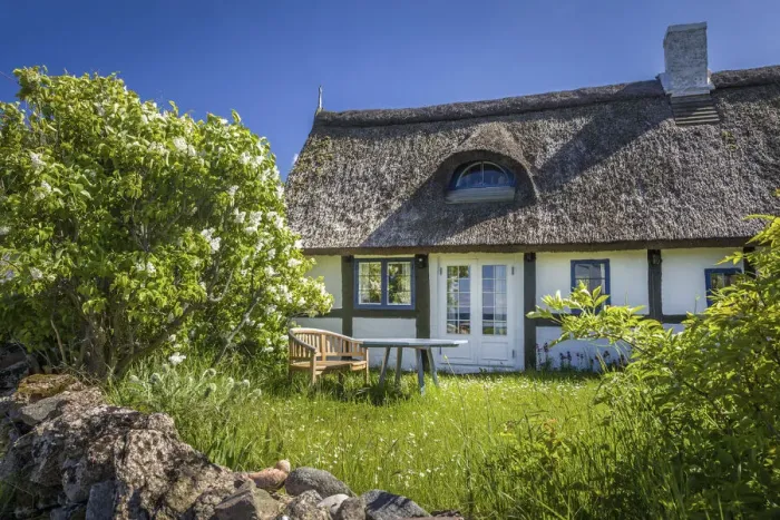 Framed Print : Idyllic half-timbered house in Listed on Bornholm, Denmark Framed Print : Idyllic half-timbered house in Listed on Bornholm, Denmark