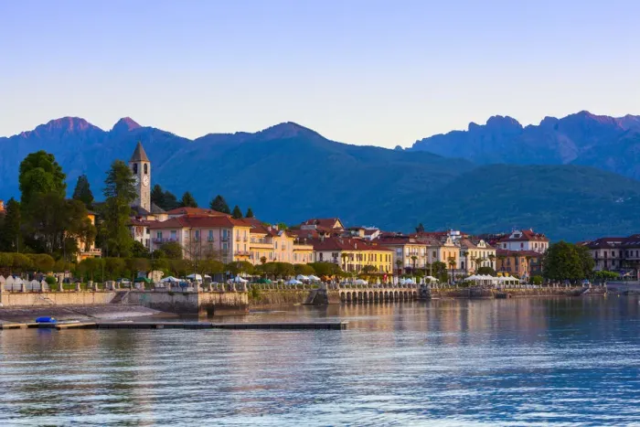 Framed Print : The idyllic lakeside village of Baveno illuminated at dawn, Lake Maggiore, Piedmont Framed Print : The idyllic lakeside village of Baveno illuminated at dawn, Lake Maggiore, Piedmont