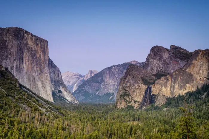 Framed Print : Idyllic shot of alpine forest amidst rocky mountains at Tunnel View Framed Print : Idyllic shot of alpine forest amidst rocky mountains at Tunnel View