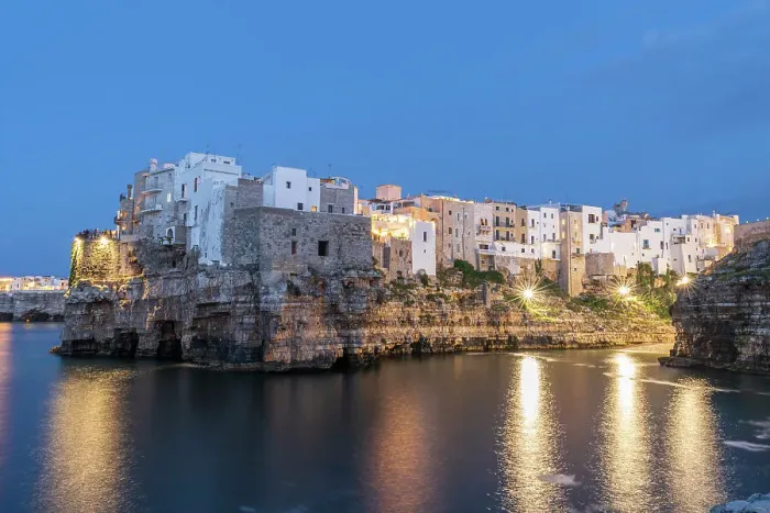 Framed Print : Illuminated fishing village of Polignano a Mare at dusk, Polignano a Mare, Bari province, Apulia, South of Italy, Italy, Europe Framed Print : Illuminated fishing village of Polignano a Mare at dusk, Polignano a Mare, Bari province, Apulia, South of Italy, Italy, Europe