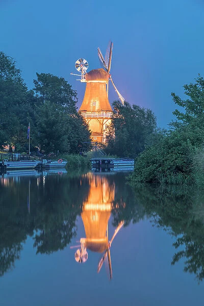 Illuminated Green Mill at blue hour, Greetsiel, East Frisia, Lower Saxony, Germany