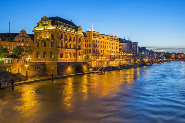 Illuminated Hotels at river Rhine at Basel at dusk, Canton Basel, Switzerland