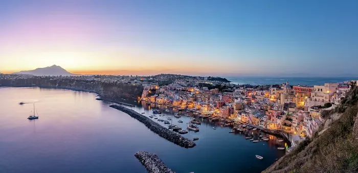 Framed Print : Illuminated houses of La Corricella fishing village and harbor at blue hour, Procida island, Gulf of Naples, Campania, Italy Framed Print : Illuminated houses of La Corricella fishing village and harbor at blue hour, Procida island, Gulf of Naples, Campania, Italy