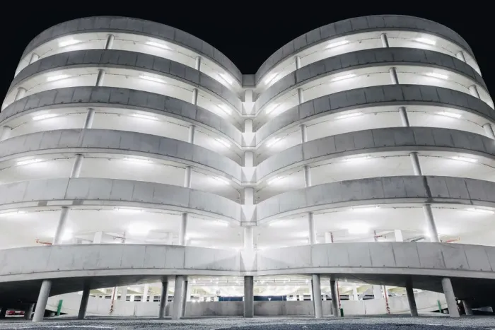 Framed Print : Illuminated parking garage concrete structure at night, Hamburg, Germany