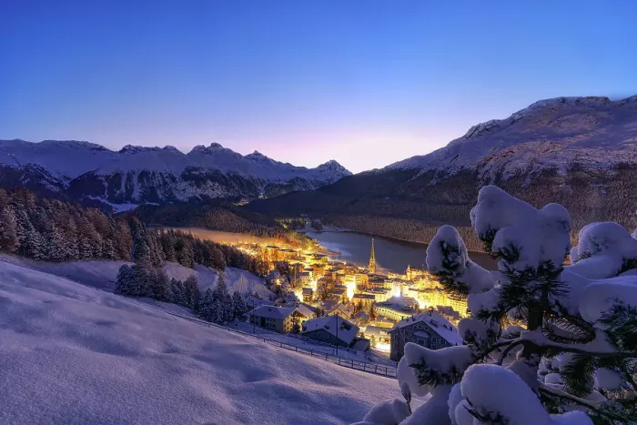 Framed Print : Illuminated village of Saint Moritz covered with snow at dusk, Graubunden canton, Engadin, Switzerland Framed Print : Illuminated village of Saint Moritz covered with snow at dusk, Graubunden canton, Engadin, Switzerland