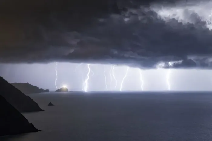 Framed Print : an impressive summer lightning storm is about to hit the Isle of Tino Framed Print : an impressive summer lightning storm is about to hit the Isle of Tino