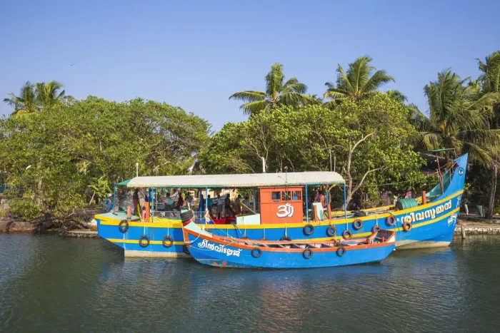 Framed Print : India, Kerala, Kollam, Fishing trawlers on Backwaters
