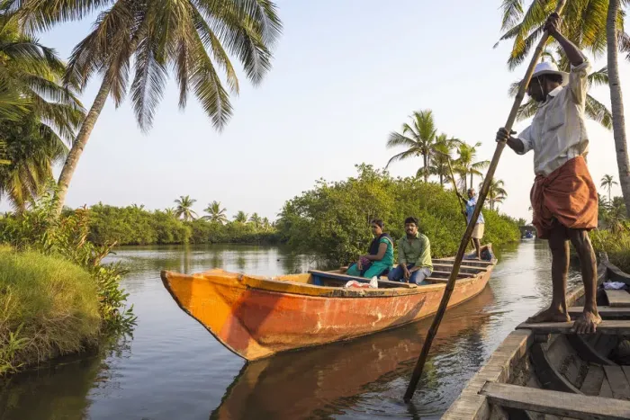 Framed Print : India, Kerala, Kollam, Munroe Island, Dug out canoe ride on backwaters