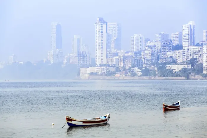 Framed Print : India, Maharashtra, Mumbai, fishing boats floating on the Arabian sea with the skyscrapers Framed Print : India, Maharashtra, Mumbai, fishing boats floating on the Arabian sea with the skyscrapers