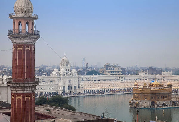 India, Punjab, Amritsar, Pilgrims at The Harmandir Sahib, known as The Golden Temple