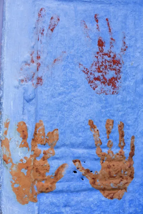 Framed Print : India, Rajasthan, Jodhpur, Hand prints on a blue wall Framed Print : India, Rajasthan, Jodhpur, Hand prints on a blue wall