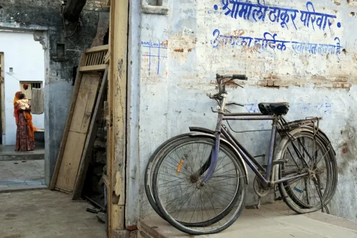 Framed Print : India, Rajasthan, Narlai. Bikes rest outside the doors of a traditional house in the remote village of Framed Print : India, Rajasthan, Narlai. Bikes rest outside the doors of a traditional house in the remote village of