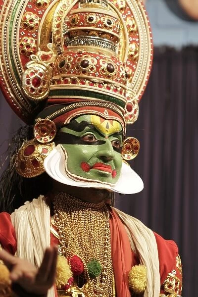 India, South India, Kerala. Kathakali actor-dancer (paccha) performing a traditional show in Cochin