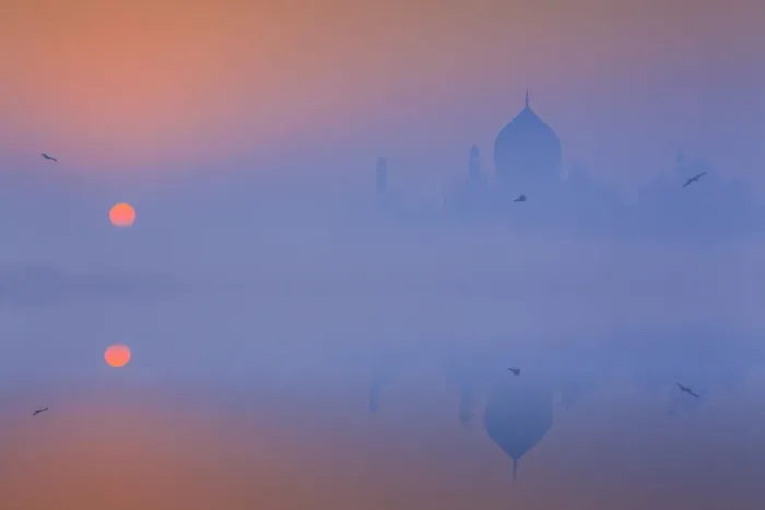 Framed Print : India, Taj Mahal memorial on a foggy morning with the sun rising in the background Framed Print : India, Taj Mahal memorial on a foggy morning with the sun rising in the background