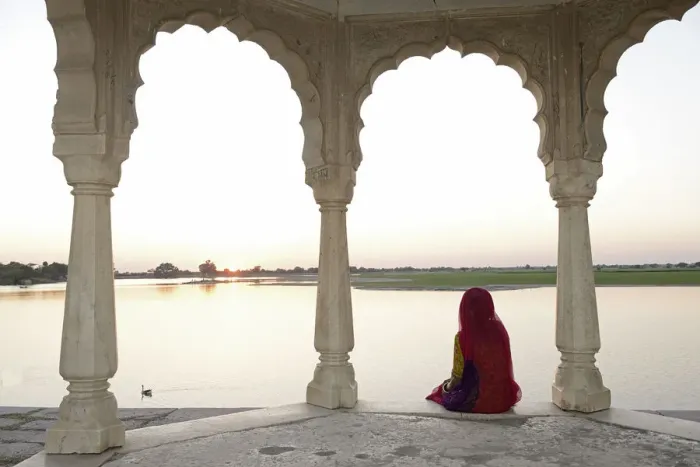 Framed Print : Indian woman watching sunset, Village of Pachewar, Rajasthan, India, Asia Framed Print : Indian woman watching sunset, Village of Pachewar, Rajasthan, India, Asia