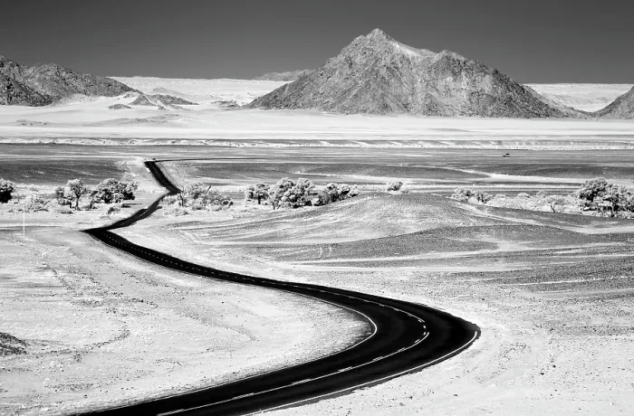 Framed Print : Infrared view of tarmac road winding through the Namib Desert, Sesriem, Namibia Framed Print : Infrared view of tarmac road winding through the Namib Desert, Sesriem, Namibia