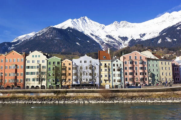 Innsbruck, Tirol, Austria, colourful houses and Alps Mountains in background