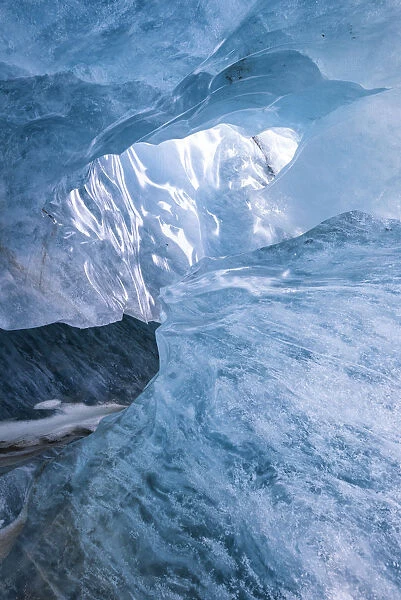 Inside the mouth of Morteratsch glacier, Bernina group, Engadin, Graubunden, Switzerland