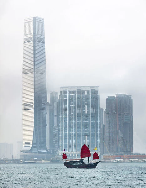 International Commerce Centre and Chinese junk boat in West-Kowloon, Hong Kong, China