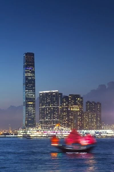 International Commerce Centre (ICC) and junk boat at dusk, Hong Kong, China