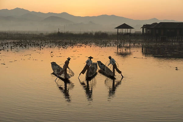Intha fishermen row on Inle Lake, Shan State, Burma, Myanmar