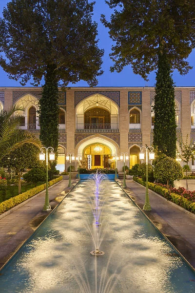 Iran, Central Iran, Esfahan, Abbasi Hotel, courtyard, dusk