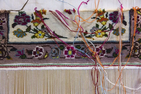 Iran, Tehran, Laleh Park, Carpet Museum of Iran, carpet weaving detail