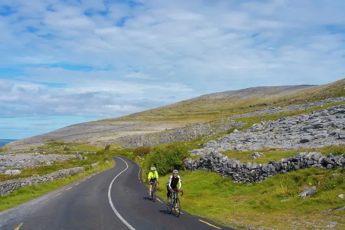 Framed Print : Ireland, Co. Clare, The Burren, Ballyvaughan, cyclists on winding road Framed Print : Ireland, Co. Clare, The Burren, Ballyvaughan, cyclists on winding road