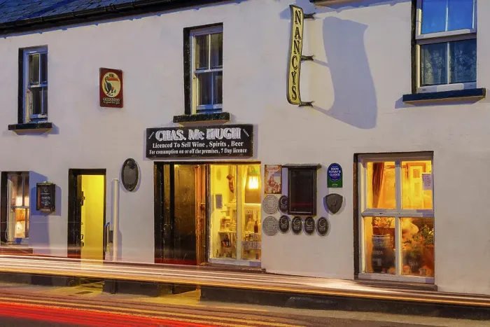 Framed Print : Ireland, Co. Donegal, Ardara, Nancys bar at night Framed Print : Ireland, Co. Donegal, Ardara, Nancys bar at night