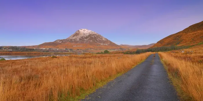 Framed Print : Ireland, Co. Donegal, Mount Errigal and country road at dusk Framed Print : Ireland, Co. Donegal, Mount Errigal and country road at dusk