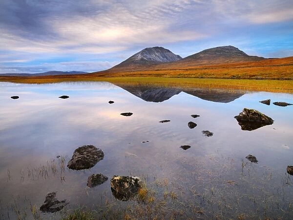 Ireland, Co. Donegal, Mount Errigal reflected in lake
