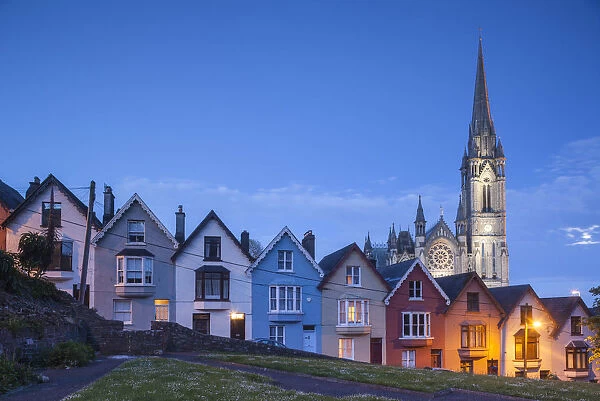 Ireland, County Cork, Cobh, Deck of Cards hillside houses and St. Colmans Cathedral