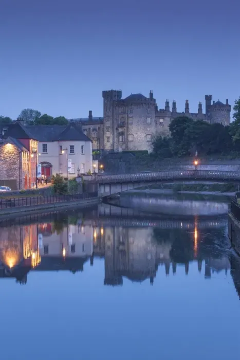 Framed Print : Ireland, County Kilkenny, Kilkenny City, pubs along River Nore and Kilkenny Castle, dusk Framed Print : Ireland, County Kilkenny, Kilkenny City, pubs along River Nore and Kilkenny Castle, dusk