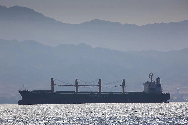 Israel, The Negev, Eilat, Red Sea beachfront, freighter