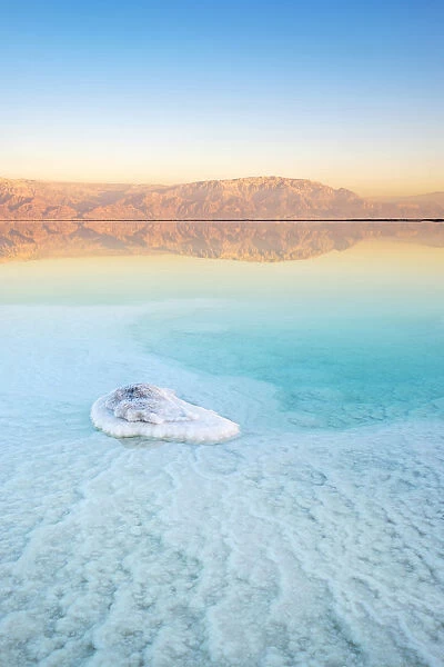 Israel, South District, Ein Bokek. Salt formations on the Dead Sea at sunset