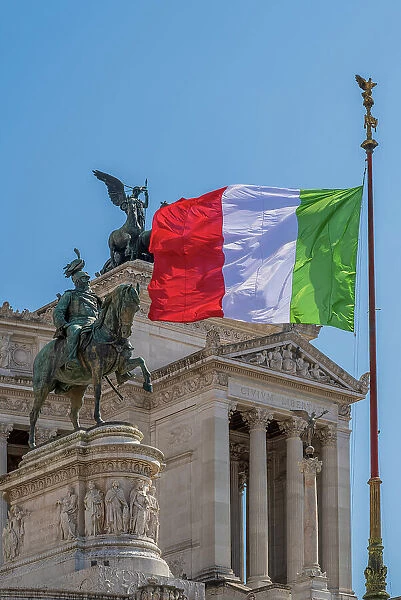 Italian flag waving in front of the National Monument to Victor Emmanuel II (Altare della Patria), Rome, Lazio, Italy