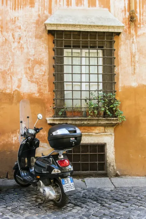 Framed Print : Italian Vespa scooter parked in a cobblestone street of Rome, Lazio, Italy Framed Print : Italian Vespa scooter parked in a cobblestone street of Rome, Lazio, Italy