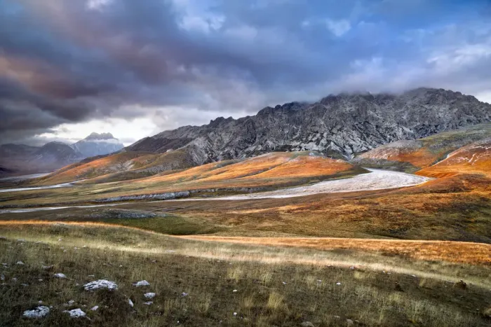 Framed Print : Italy, Abruzzo, The grasslands of Campo Imperatore colored in acid yellow are