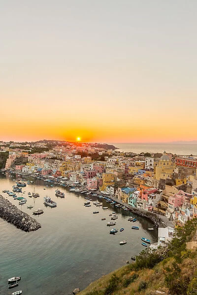 Italy, Campania, Province of Naples, Procida. Sunset at Marina di Corricella