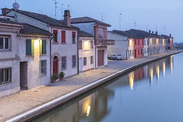 Italy, Emilia Romagna, Comacchio houses by a canal