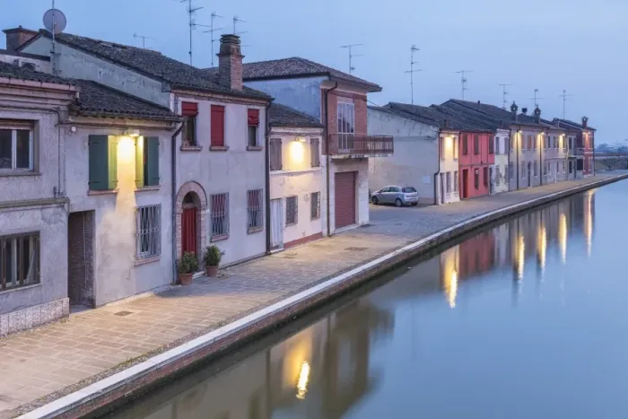 Framed Print : Italy, Emilia Romagna, Comacchio houses by a canal Framed Print : Italy, Emilia Romagna, Comacchio houses by a canal