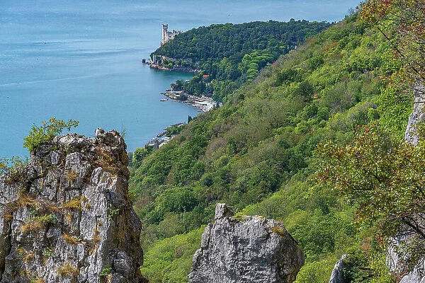 Italy, Friuli Venezia Giulia. View from the hiking path downwards to the castle of Miramare near to Triest