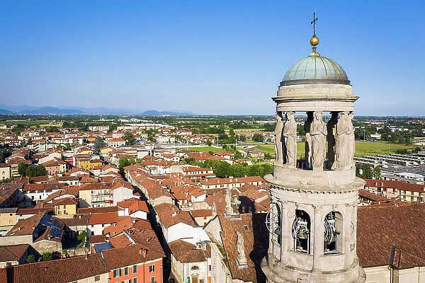 Italy, Lombardy, Bergamo, Urgnano, Elevated view town center with the bell tower of the parochial church on the foreground