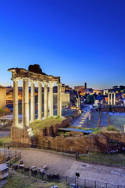 Italy, Rome, Colosseum and Roman Forum by night