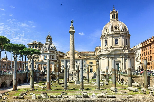 Italy, Rome, Traian forum along Fori Imperial street, with Santa Maria di Loreto church