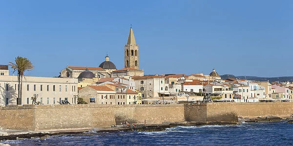 Italy, Sardinia, Alghero, View of ancient city walls and the historical center