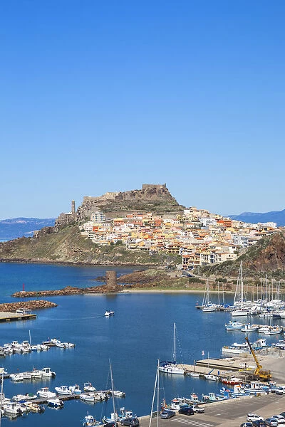 Italy, Sardinia, Sassari Province, Castelsardo, View over marina towards the ancient