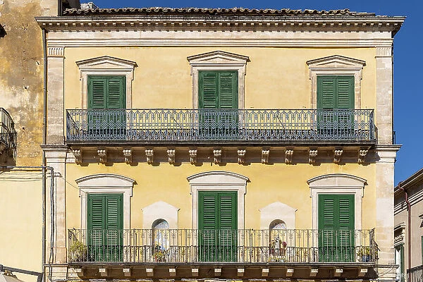 Italy, Sicily, Ragusa, a colourful building in Ragusa Ibla