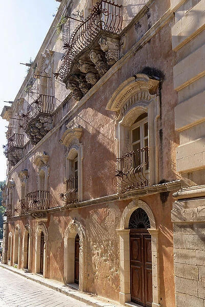 Italy, Sicily, Ragusa, a facade of a house in gothic style